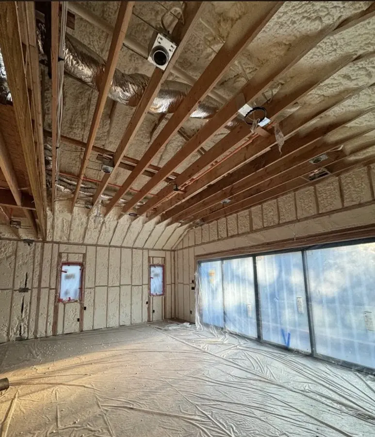 Interior walls and ceiling insulated with spray foam during new construction in Pembroke Park
